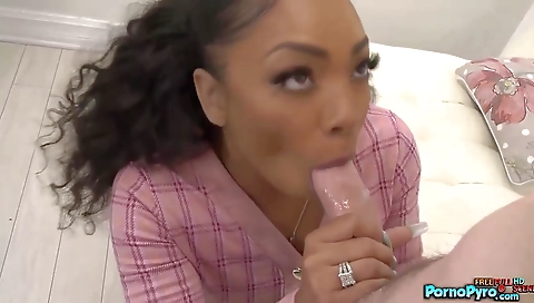 Ebony milf in a red dress enjoys a huge white cock