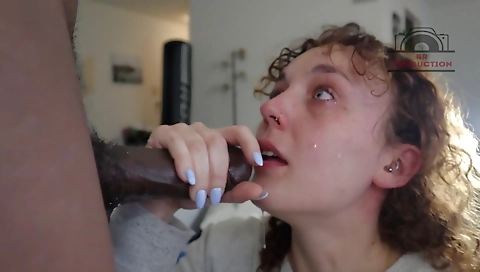 Hot brunette in a sexy black bikini takes a dick in her mouth