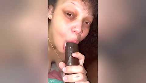 A brunette milf with a tattooed body is getting fucked hard