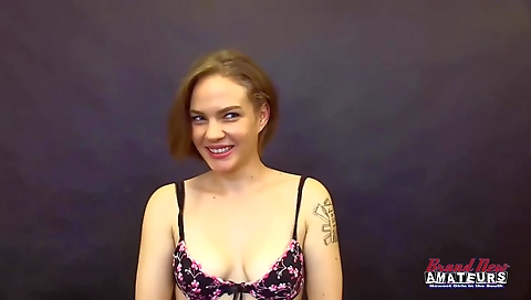 Tattooed blonde is sucking on a black man's big dong