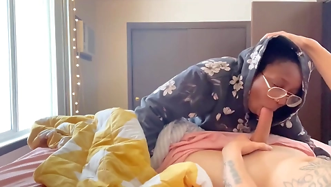 Amateur interracial video with a mature brunette and a teen