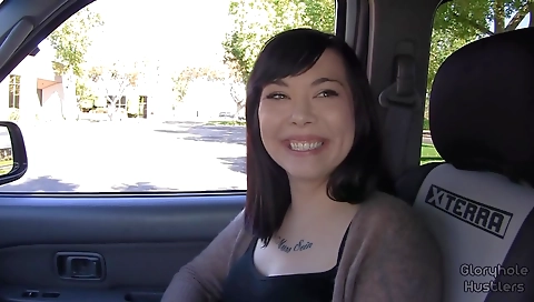 Hot brunette in a sexy outfit and a big ass in a sexy black dress