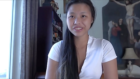 A sexy amateur asian beauty is having sex in a interracial scene