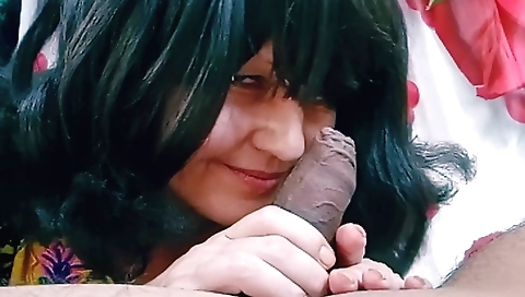 Brunette milf in sexy dress is fucking in front of the camera