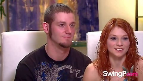 Blonde and brunette take a ride on each other on the couch